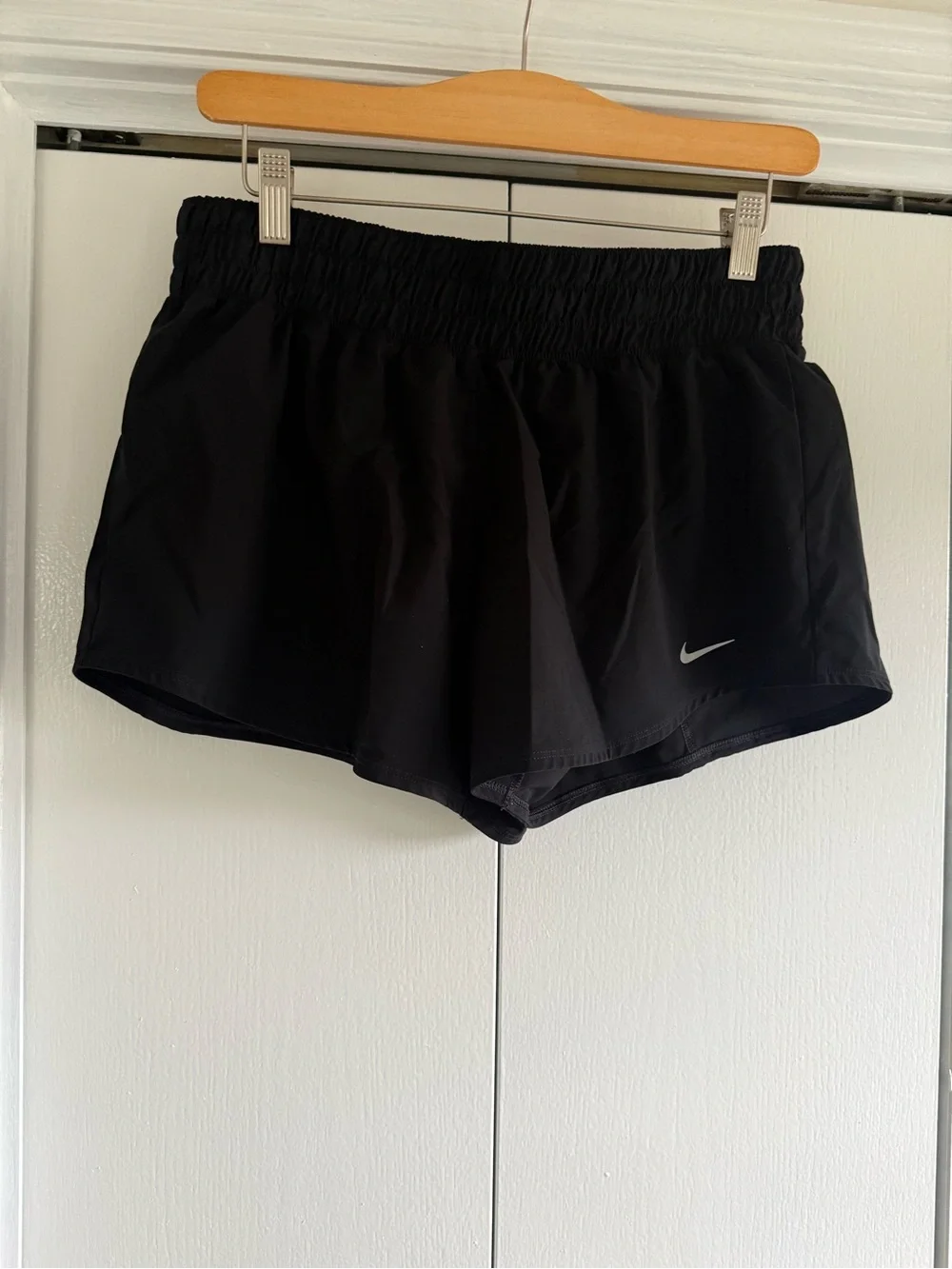 Nike Women's Black Athletic Running Shorts with Reflective Swoosh